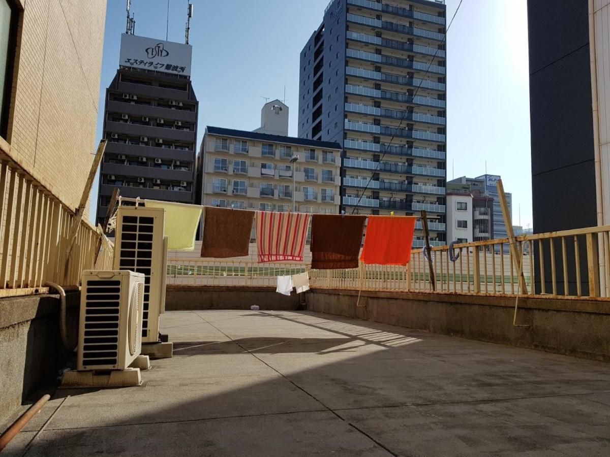 Guest House Koma Osaka Exterior photo